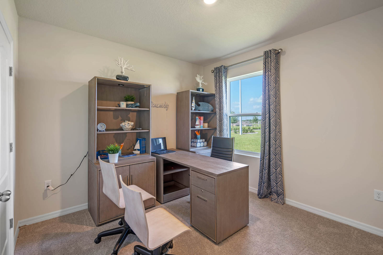 Office with desk and bookshelf