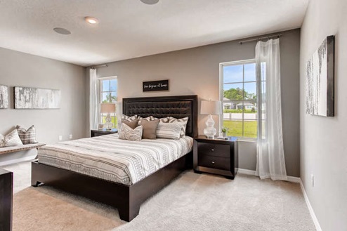Open concept kitchen with walk in pantry and stainless-steel appliances