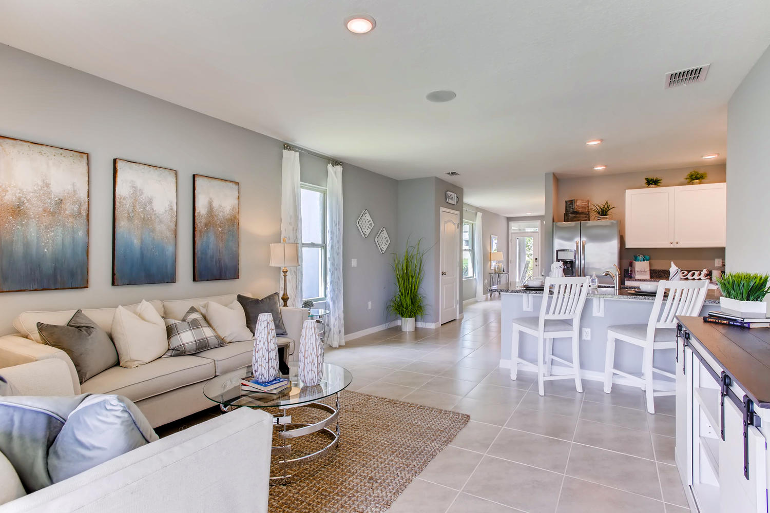 Living room overlooking the kitchen and the hallway to the front door