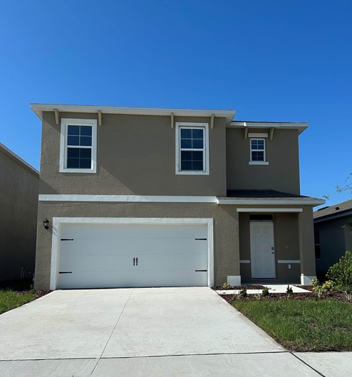 Two-story home with two-car garage