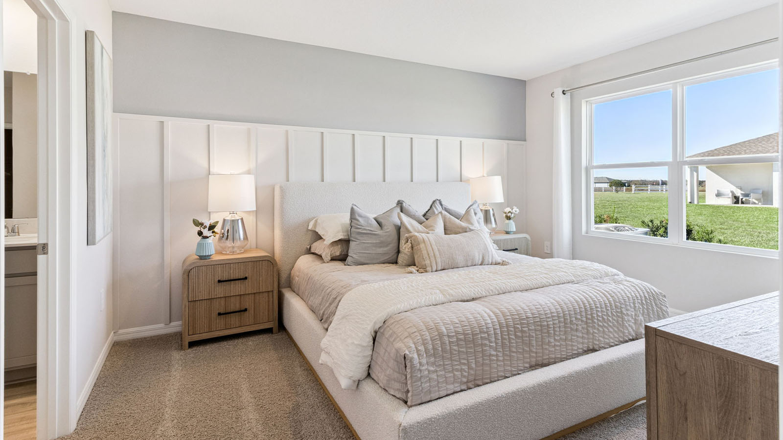 Primary bedroom with luxury vinyl planks