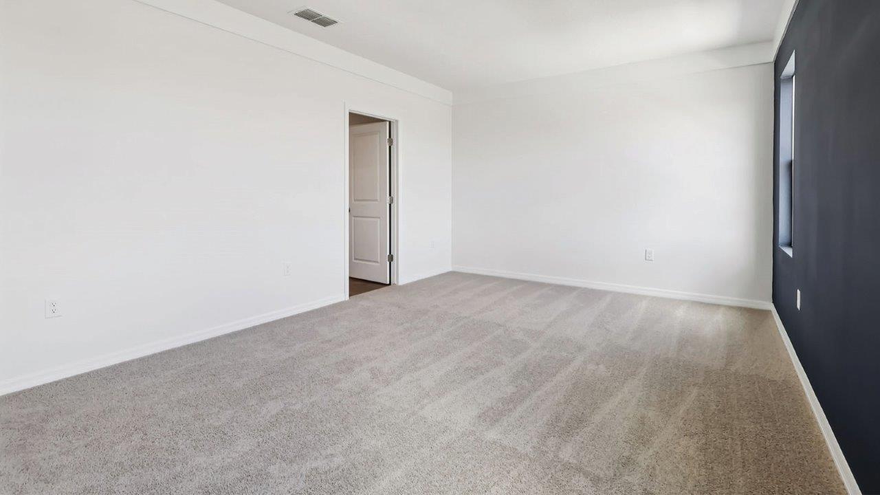 Primary bedroom with ensuite bathroom access
