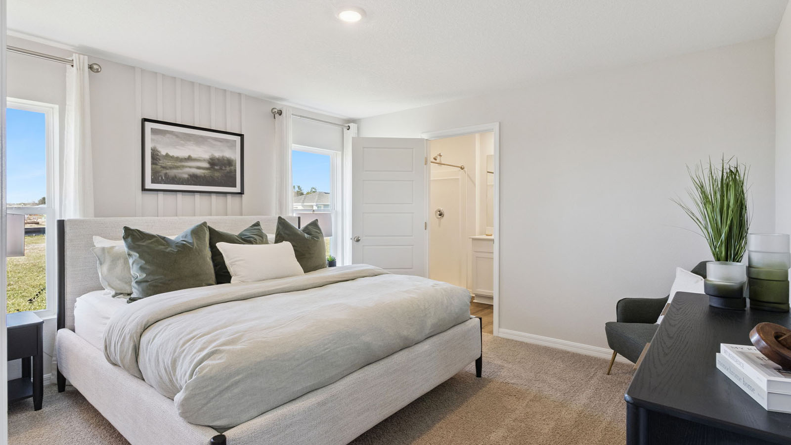 Primary bedroom with luxury vinyl planks