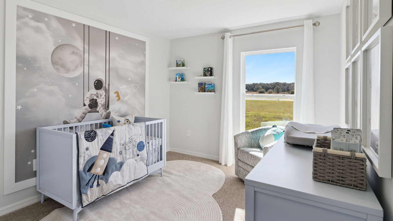 nursery bedroom with carpet