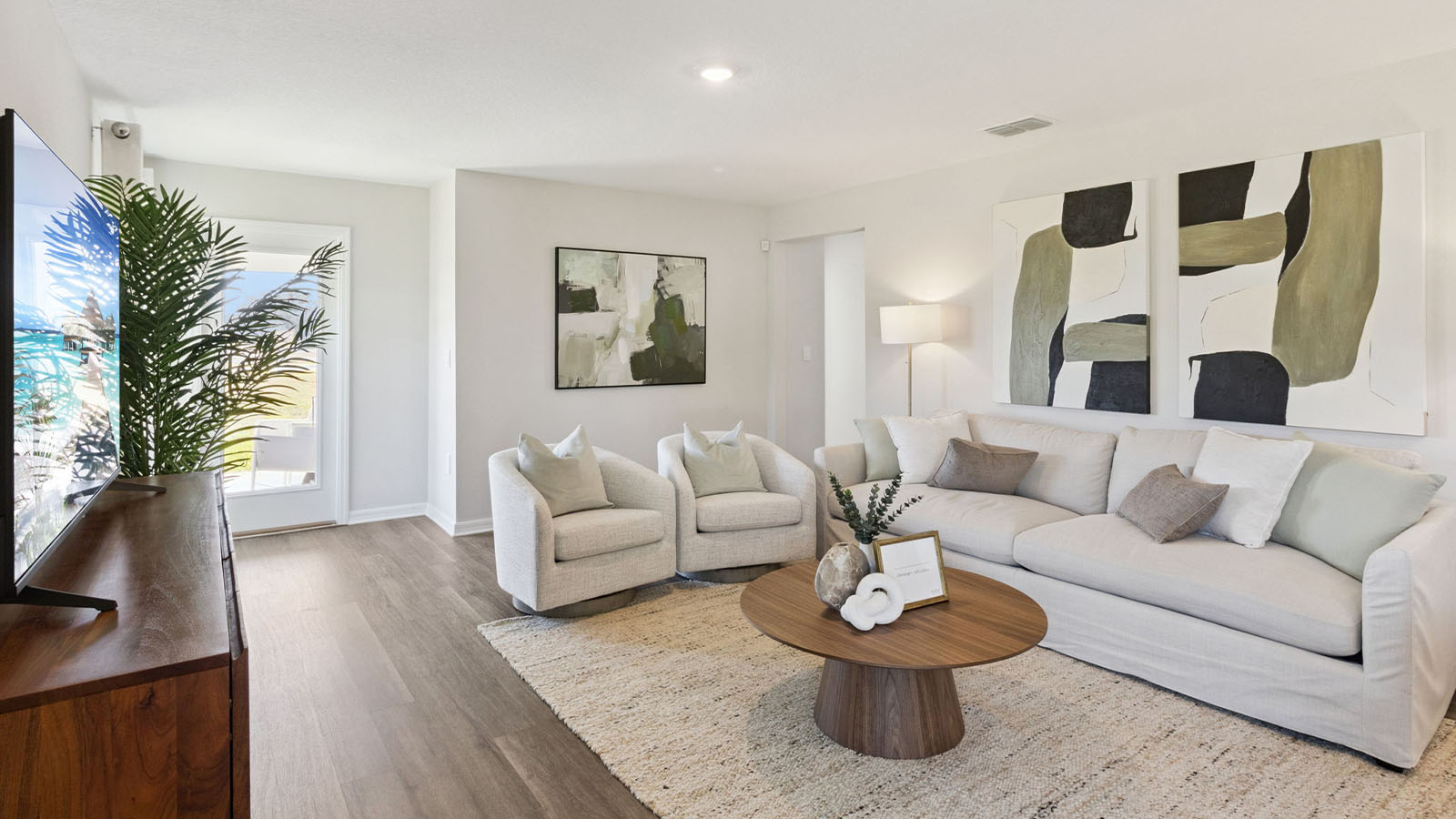 Living room with Luxury Vinyl Plank Flooring throughout