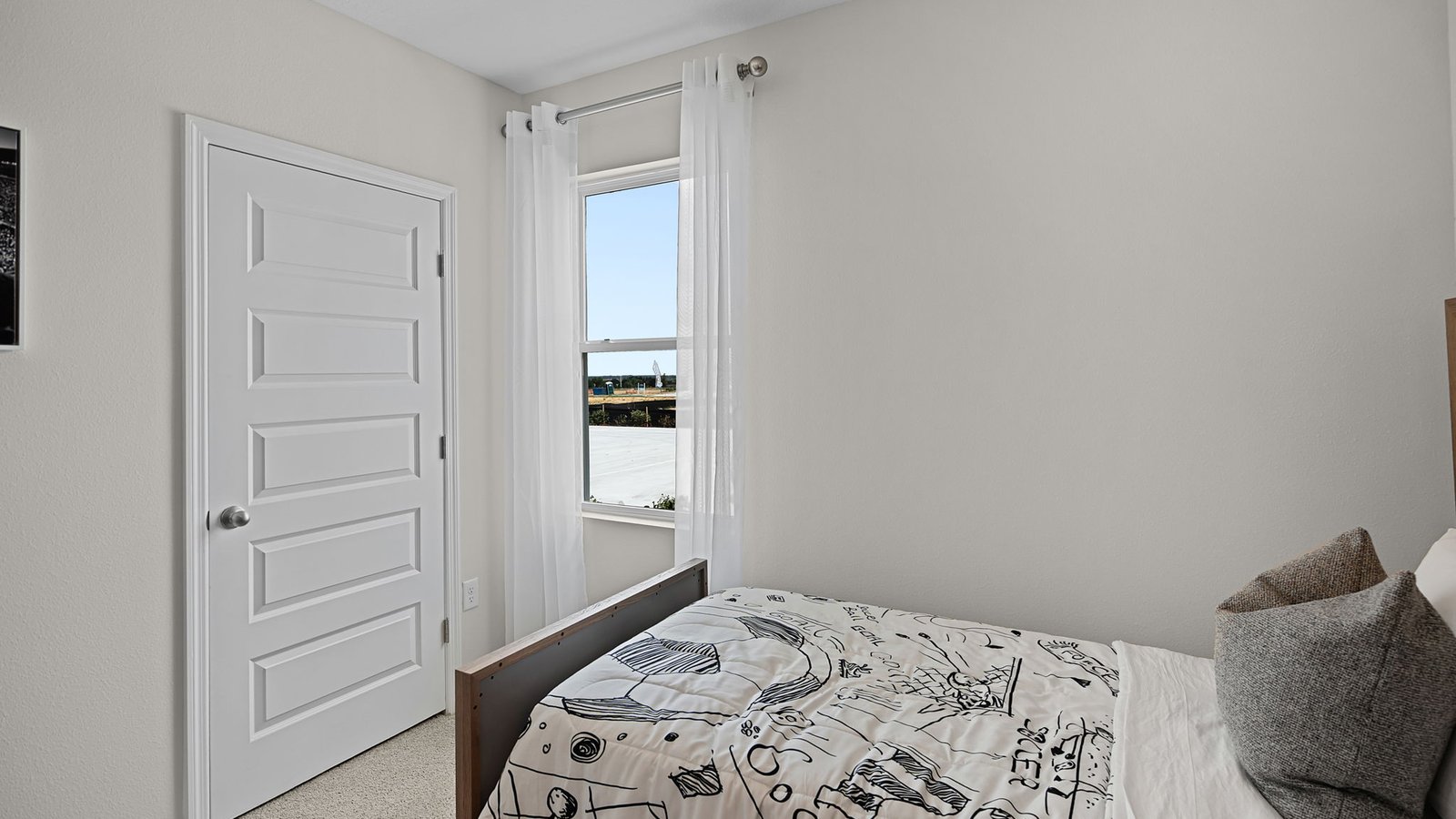 Office with window and carpet flooring
