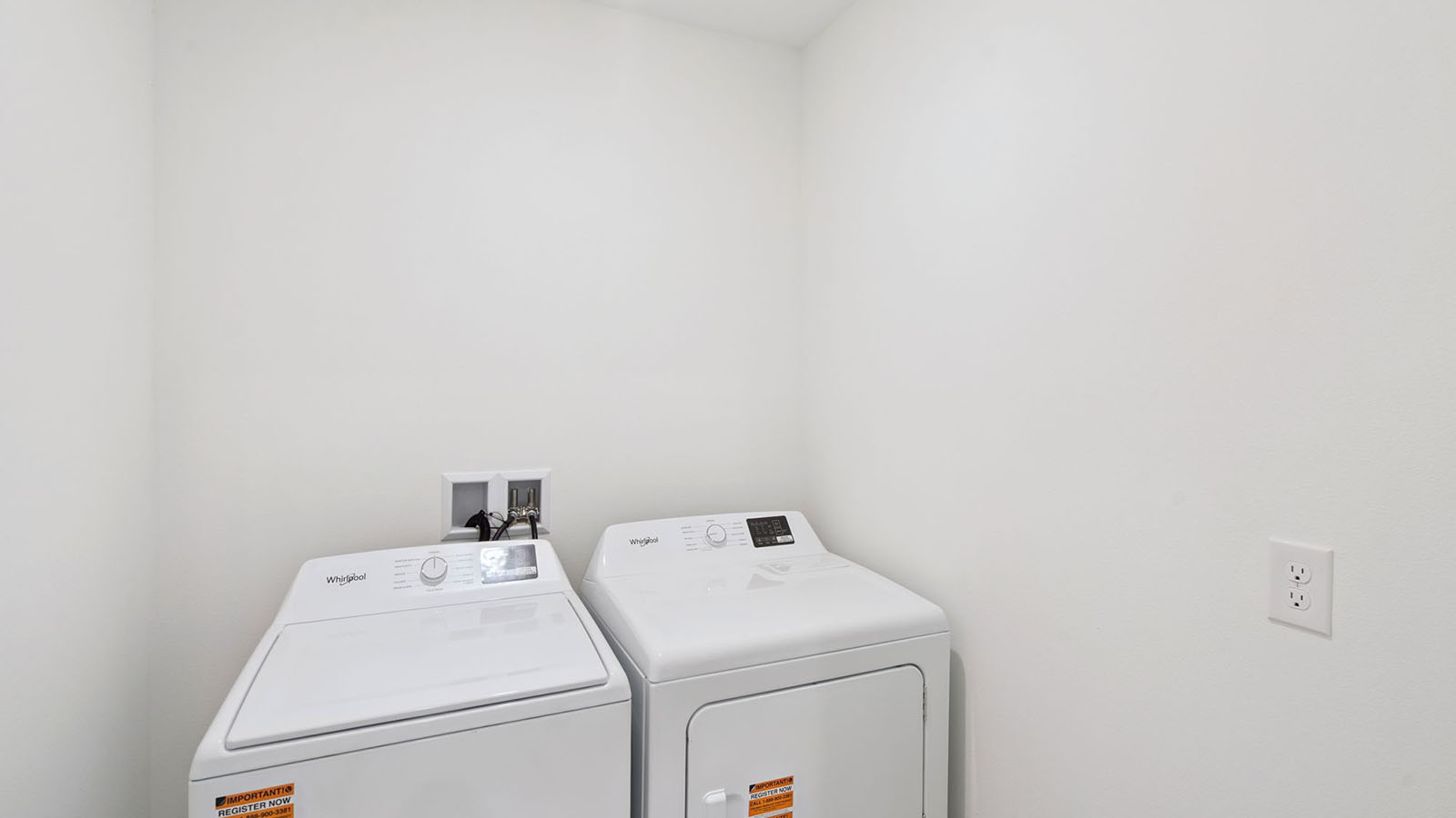 Laundry room with washer and dryer