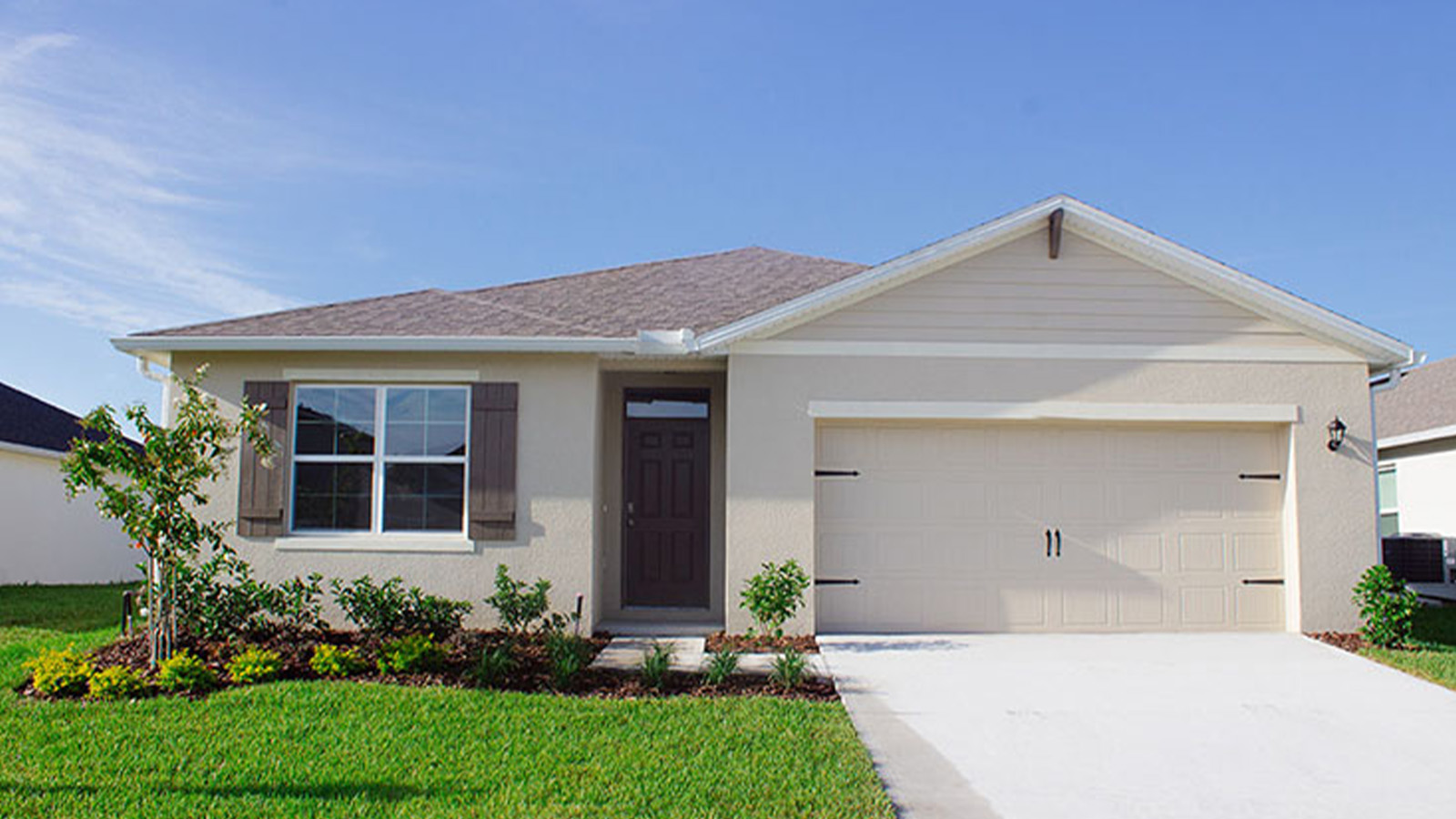 Exterior single family home with two car garageExterior single family home with two car garage