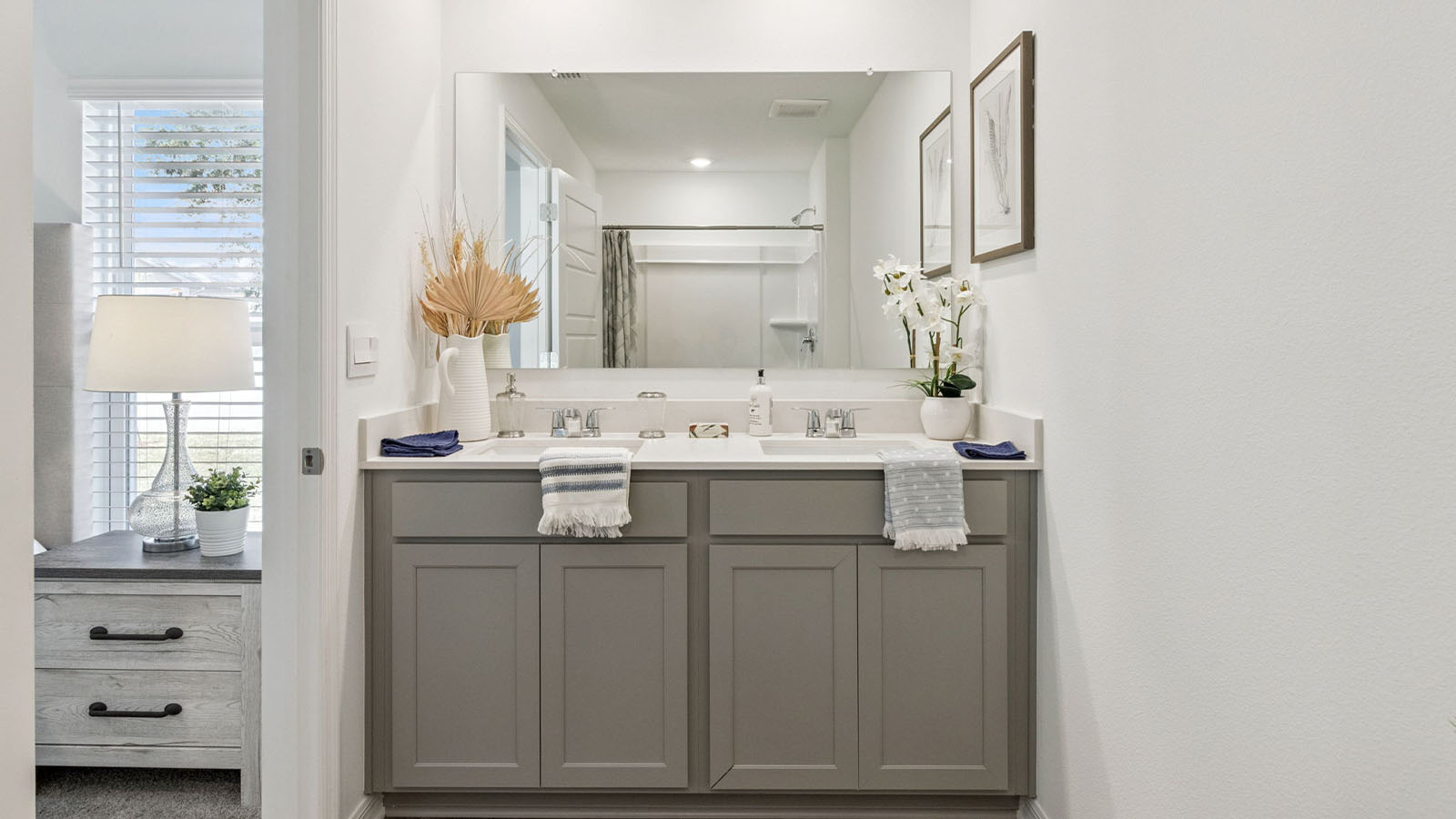 primary bathroom bathroom with dual vanity sink