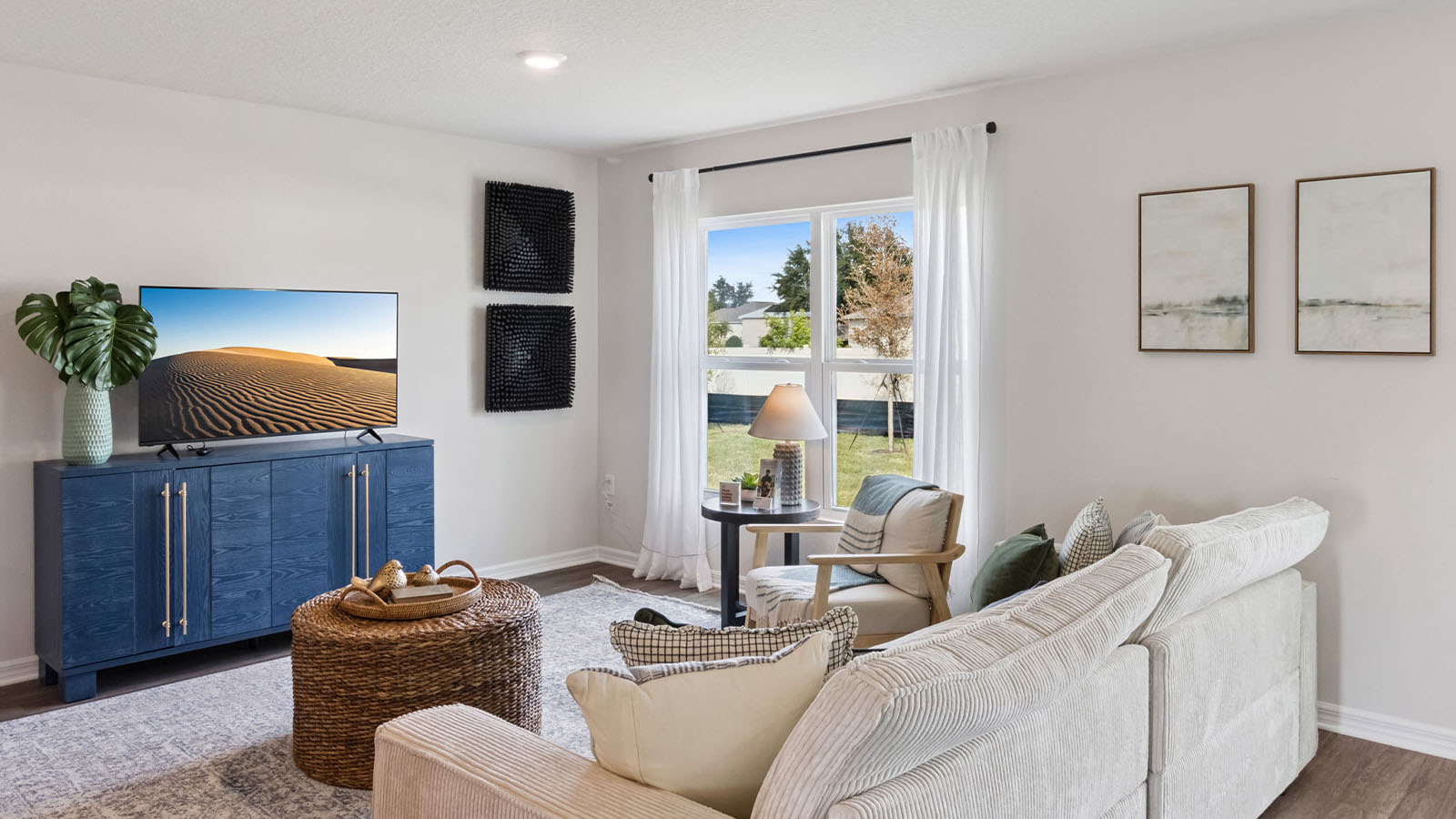 Living room with windows to the backyard