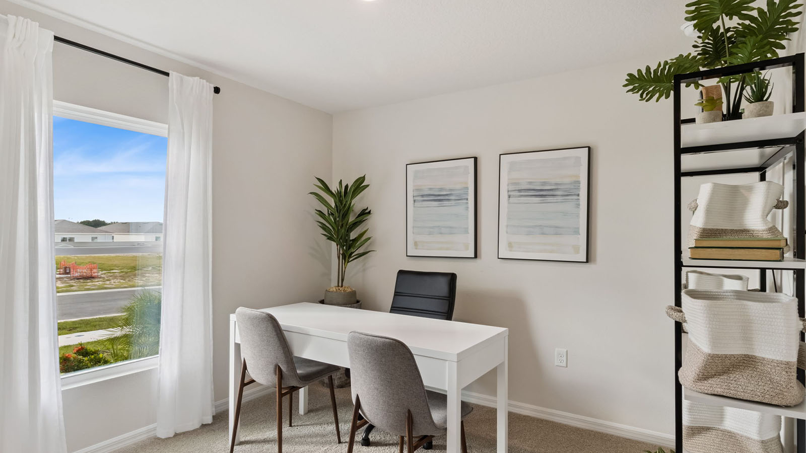 Guest bedroom as an office with carpet