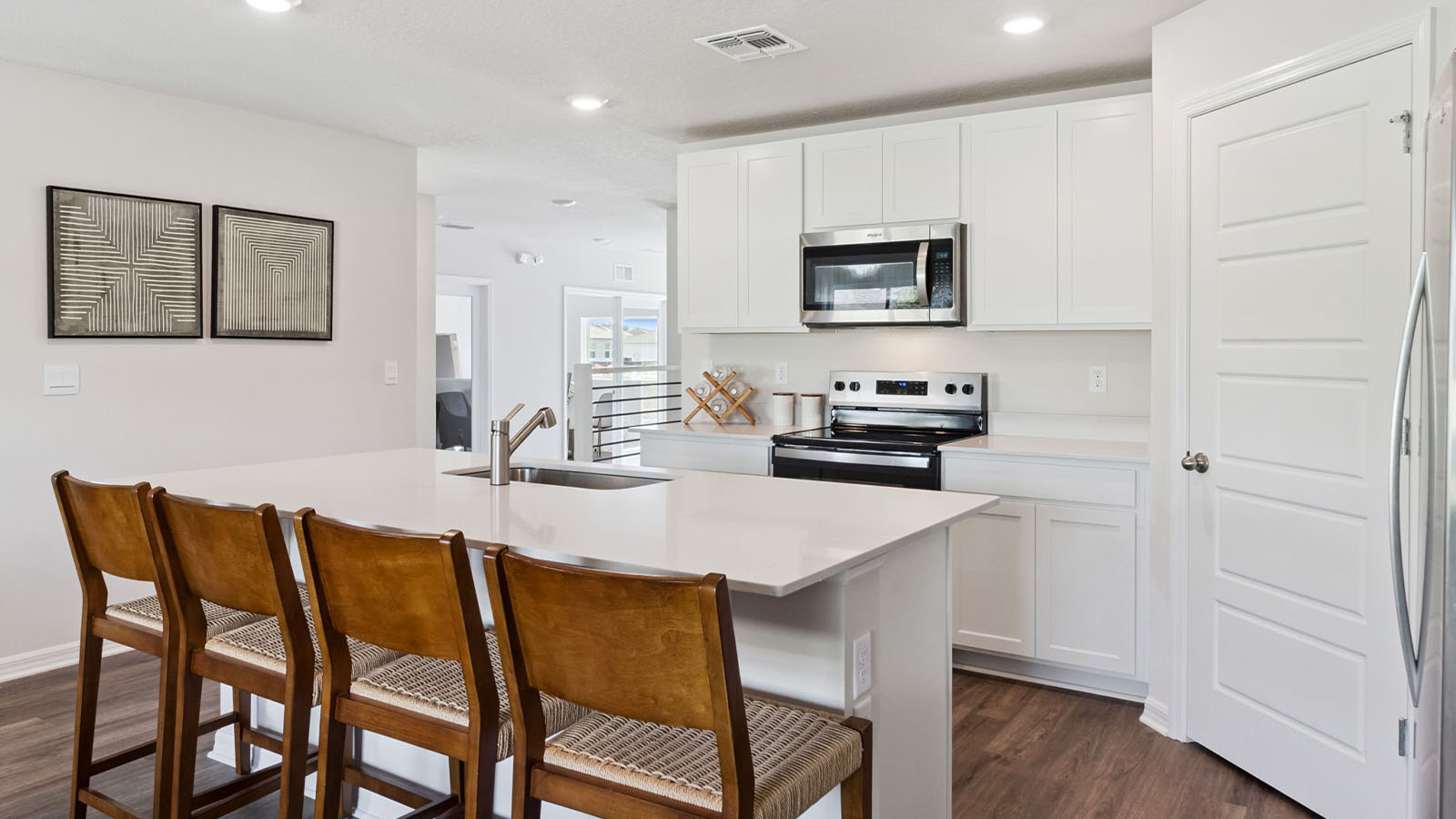 Kitchen with island and bar stools