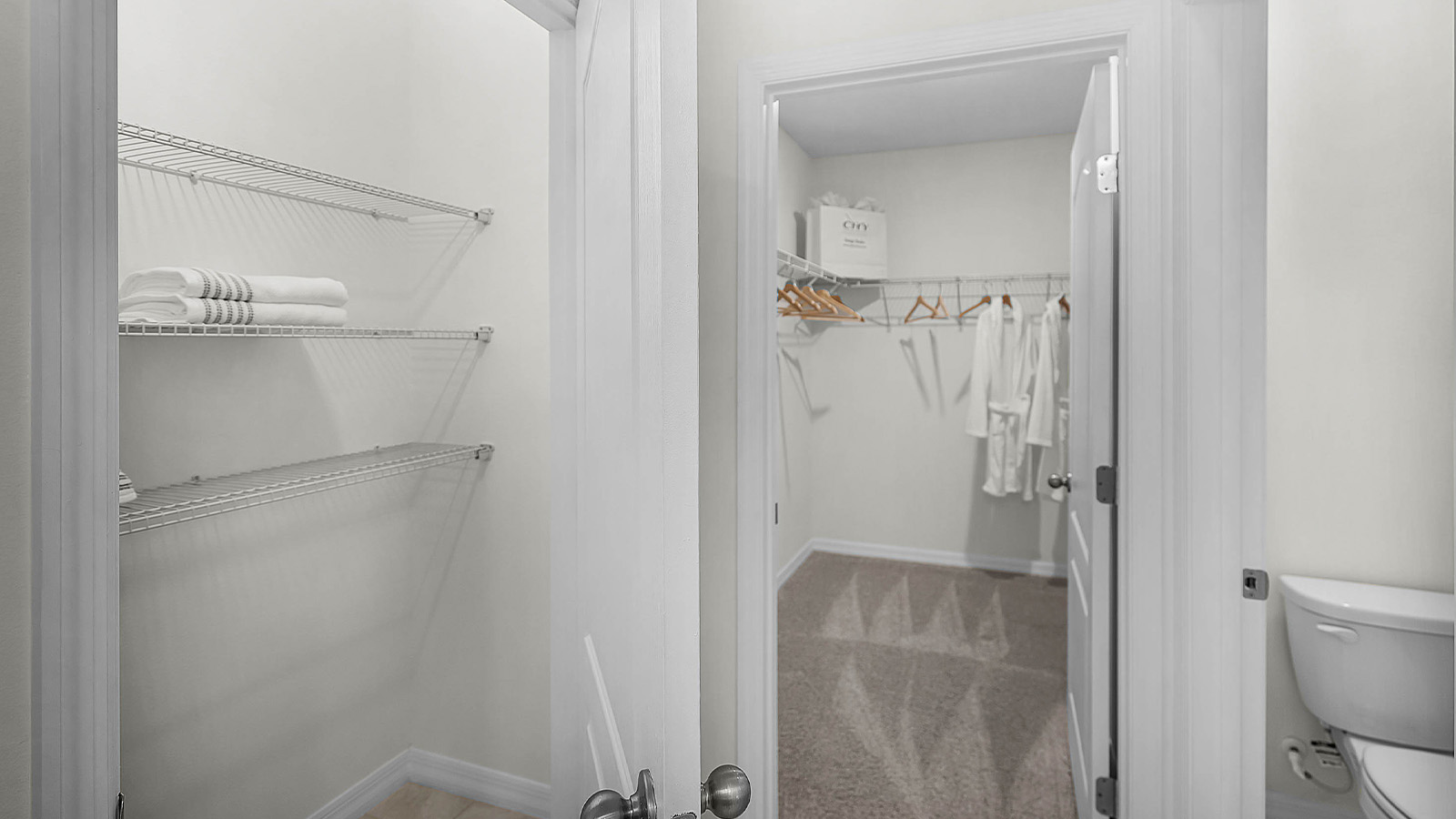 Bathroom closet next to walk in closet