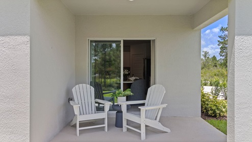 Covered patio with lounge chairs
