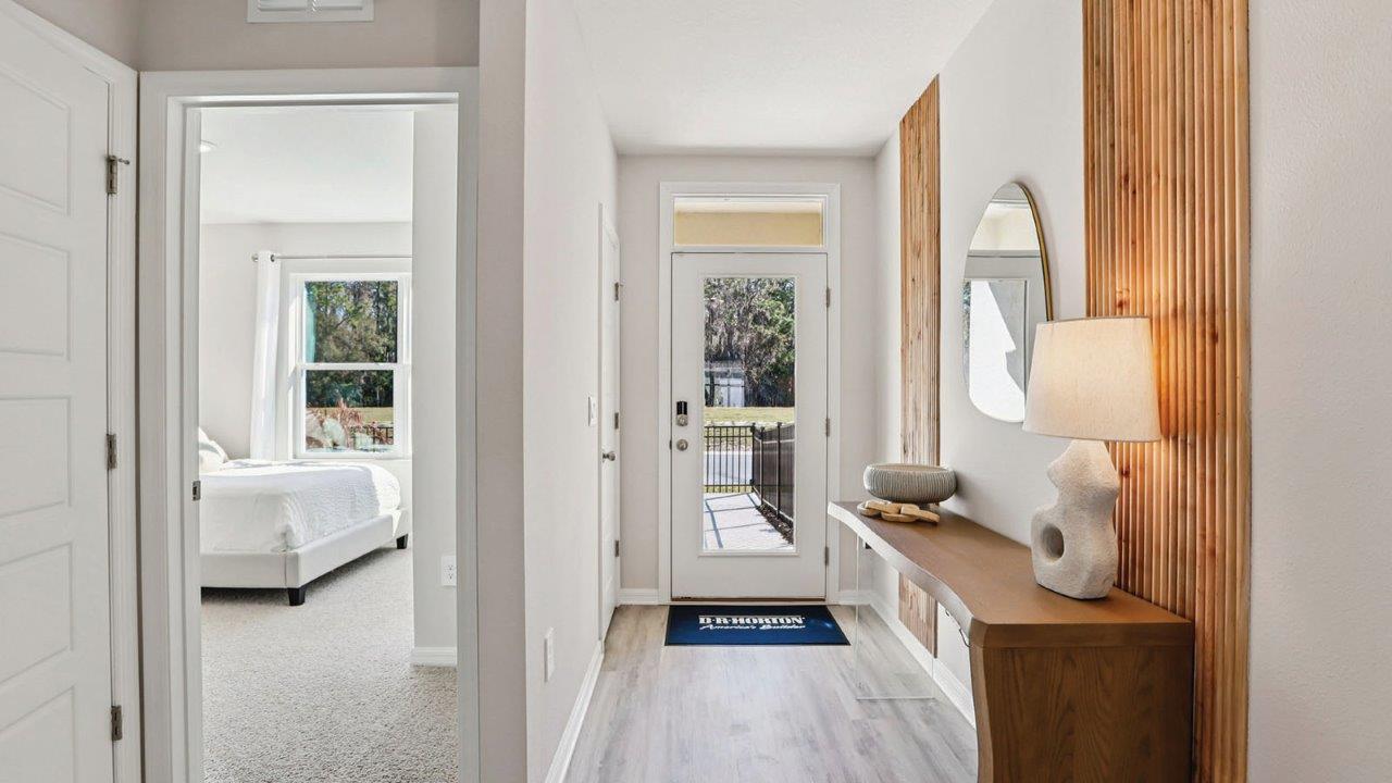 entry way with table and decor