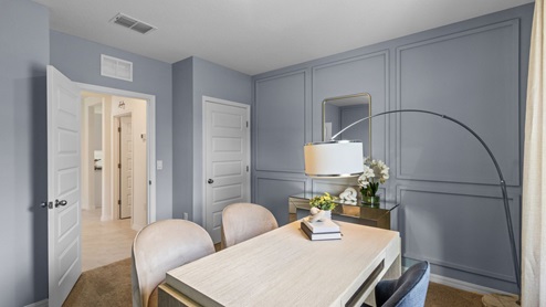Guest bedroom furnished as an office