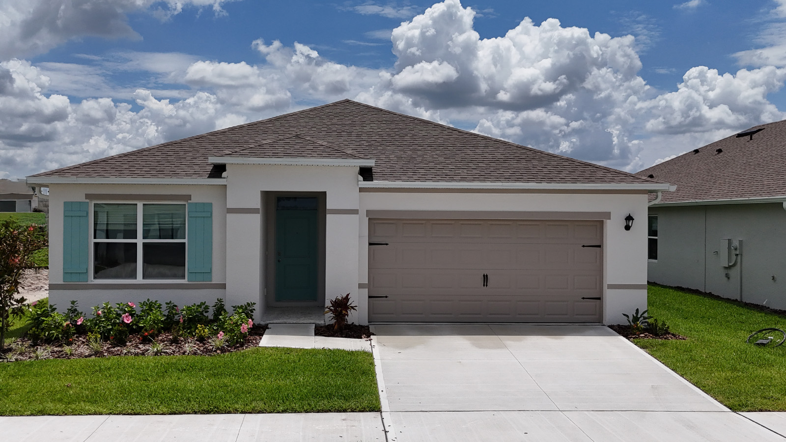 Exterior single family home with two car garage