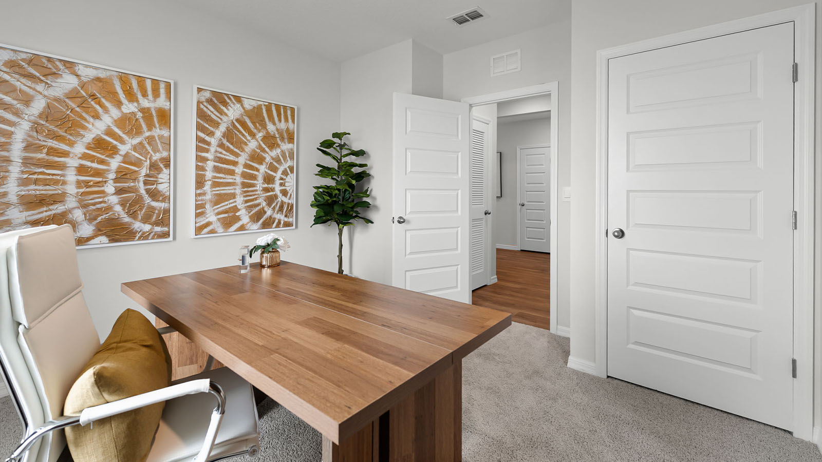 Office with view of door and closet