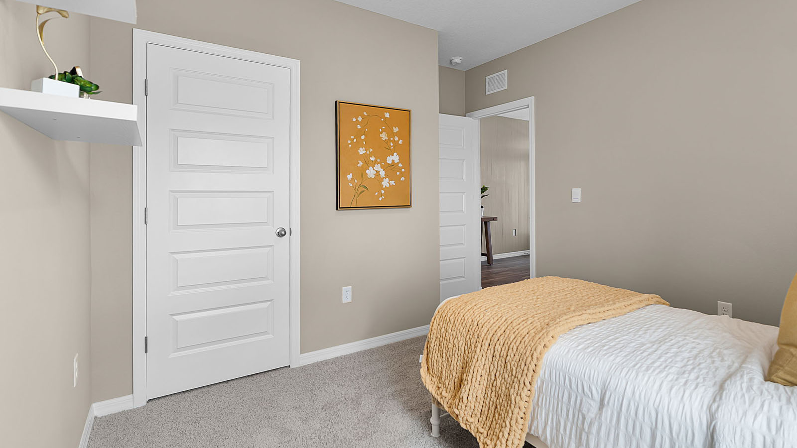 Kids bedroom with carpet throughout