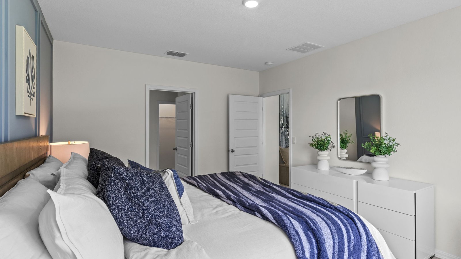 Primary bathroom with dual vanity and walk-in shower
