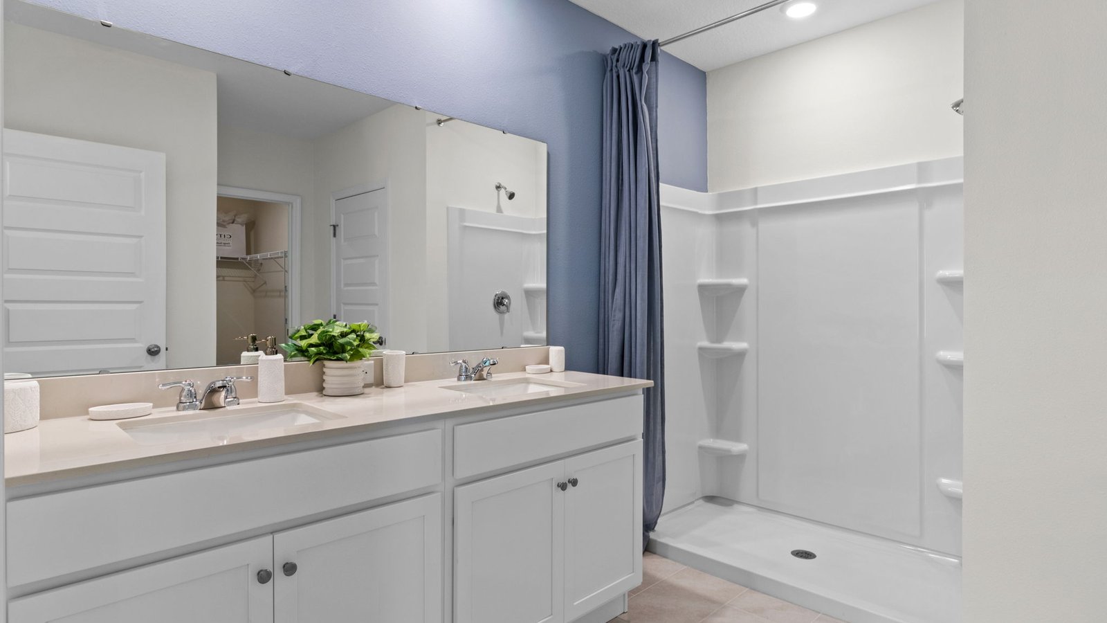 Primary bathroom with walk in closet