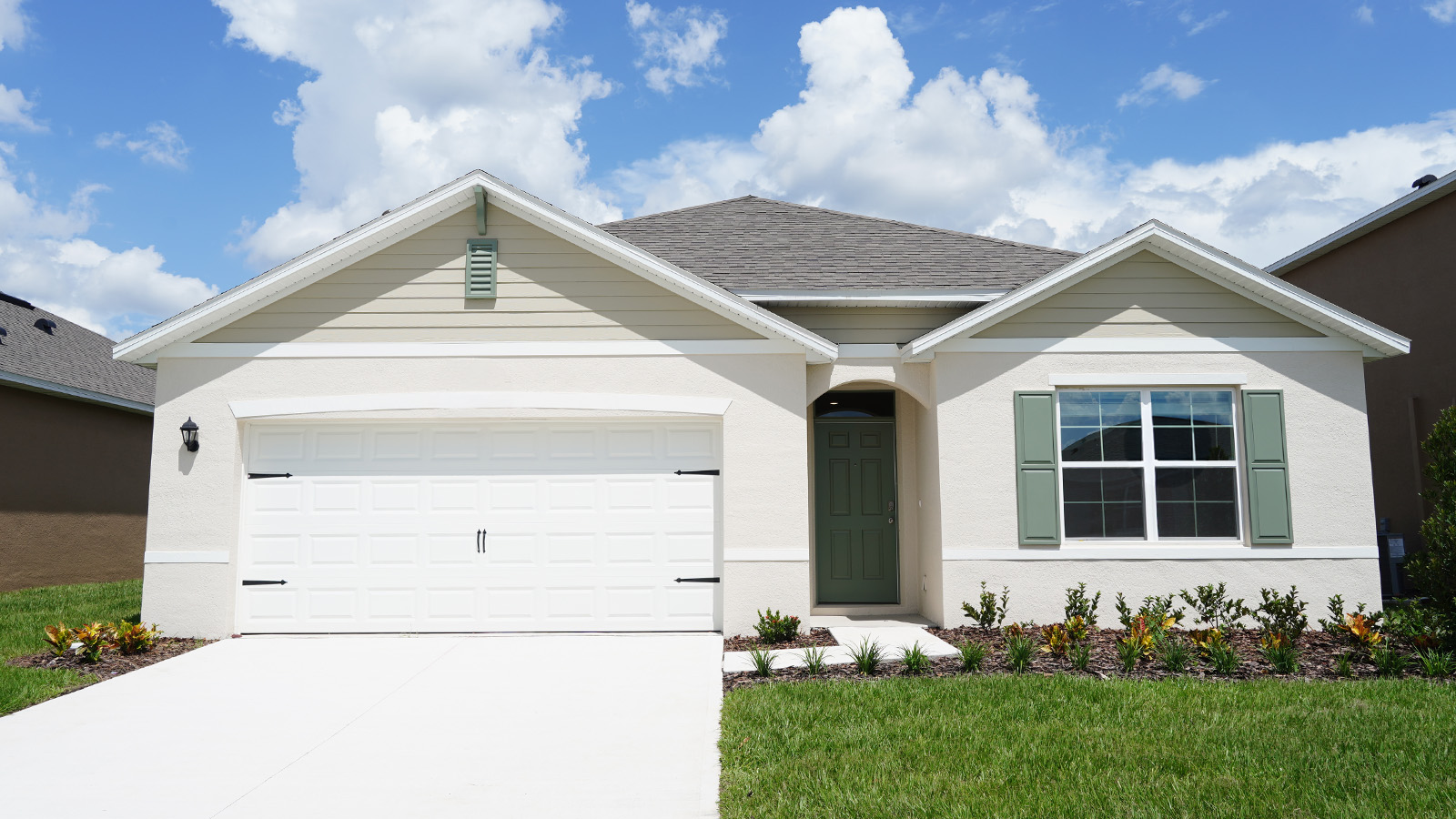 Exterior single family home with two car garage