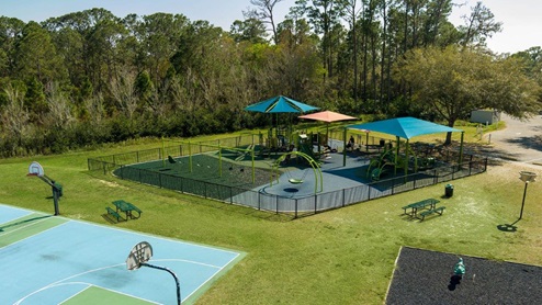 aerial view of basketball court and park