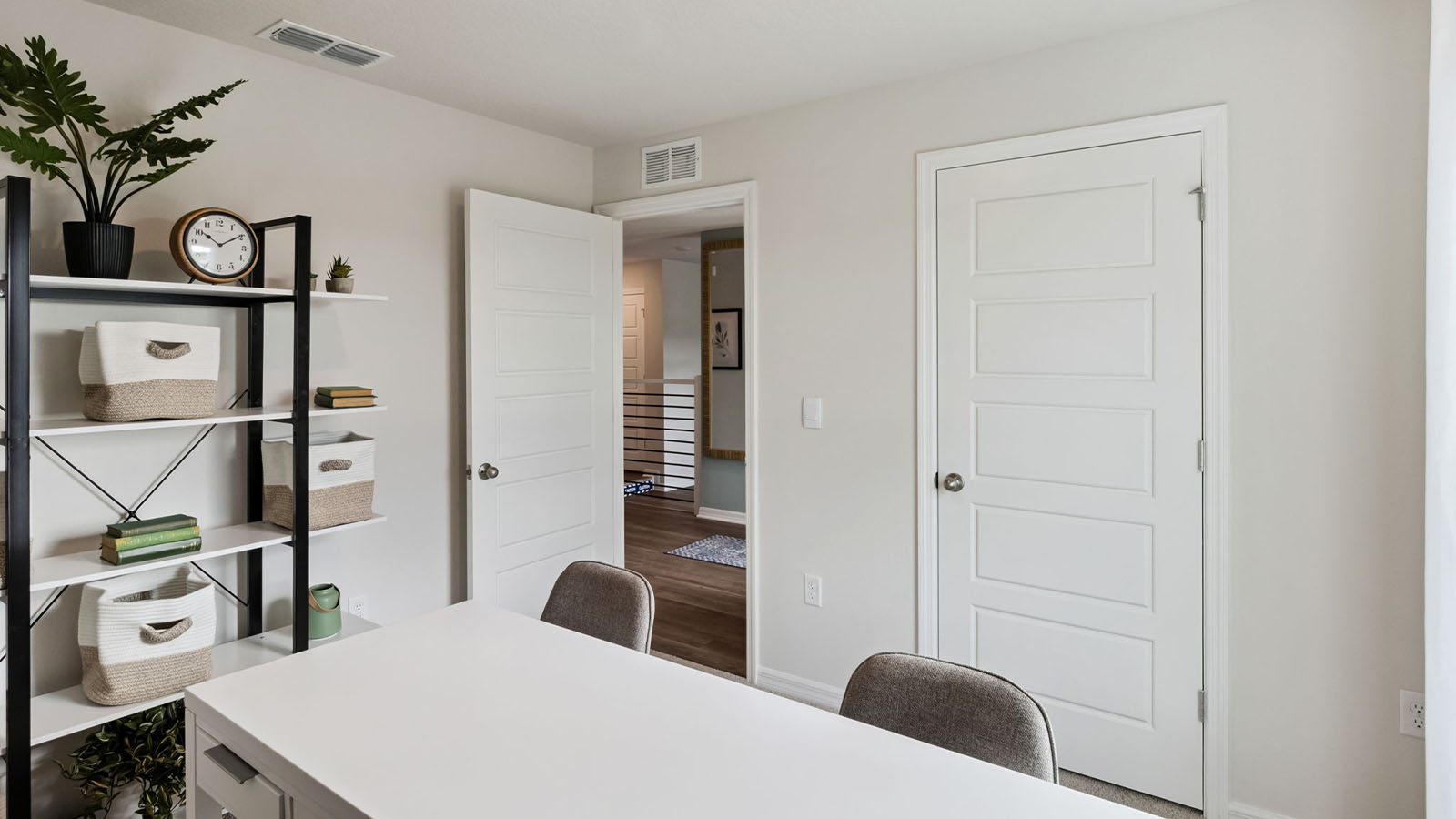 Guest bedroom as an office with carpet