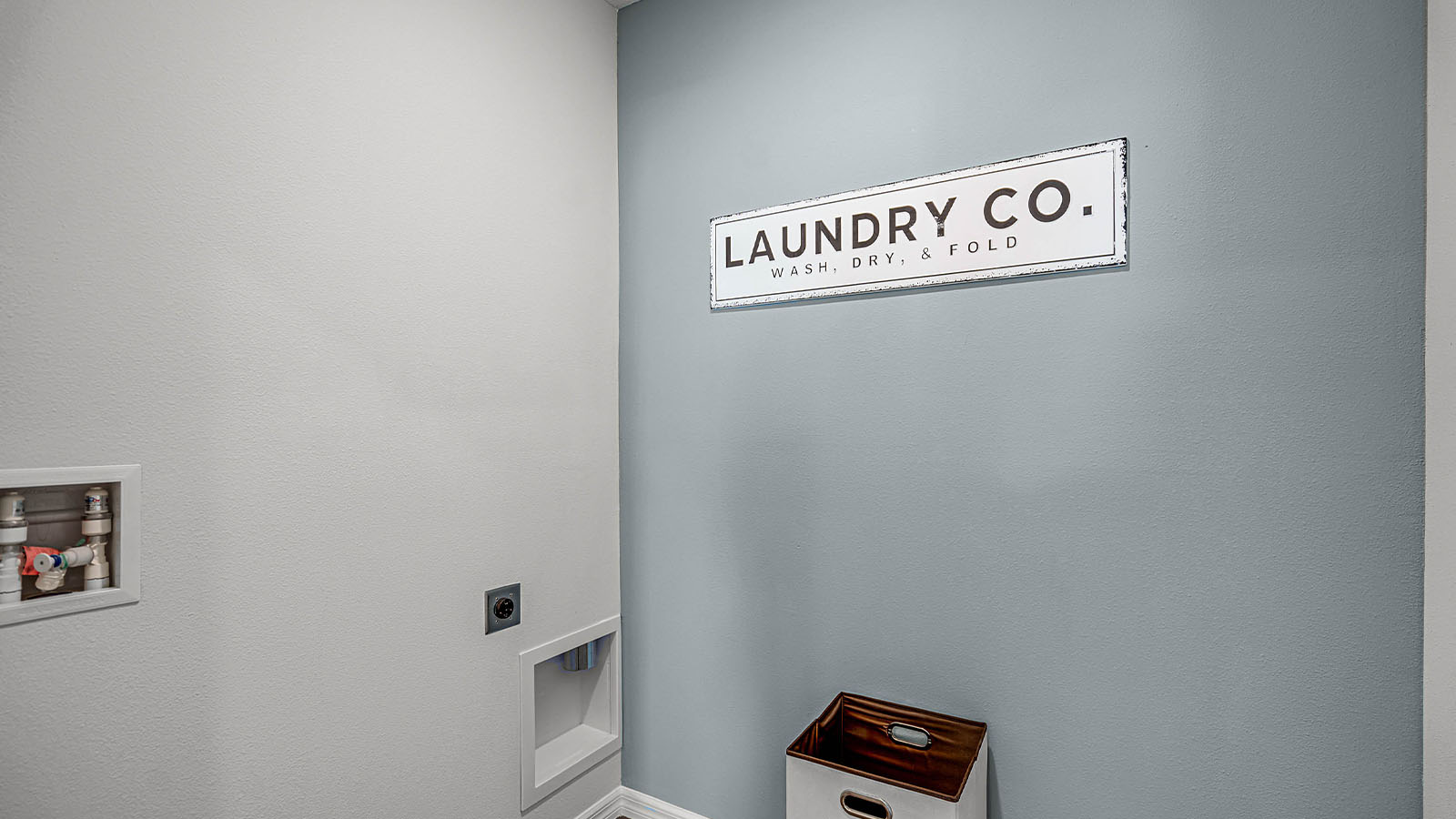 Laundry room with decorations