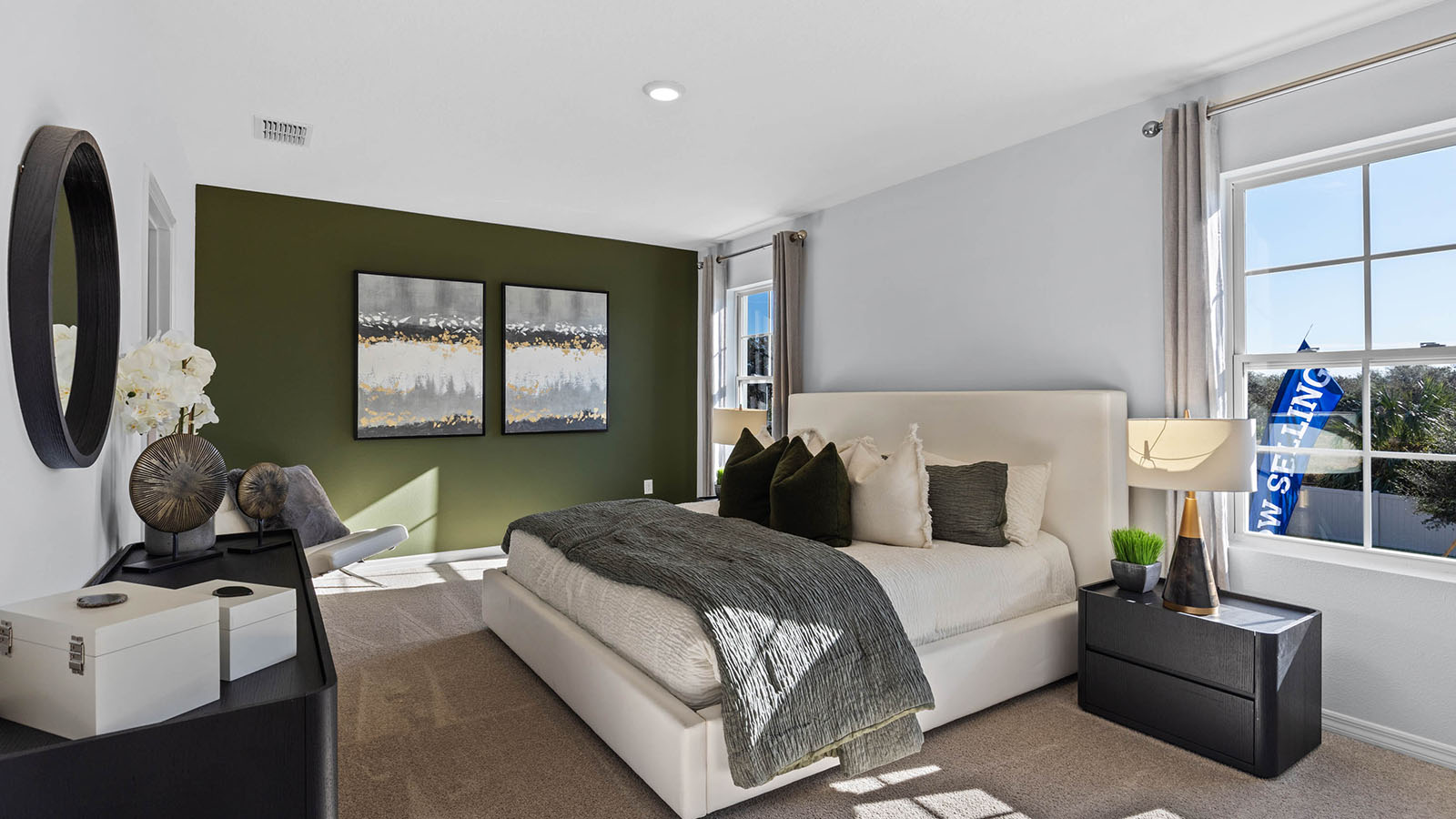 Primary bedroom with kind size bed