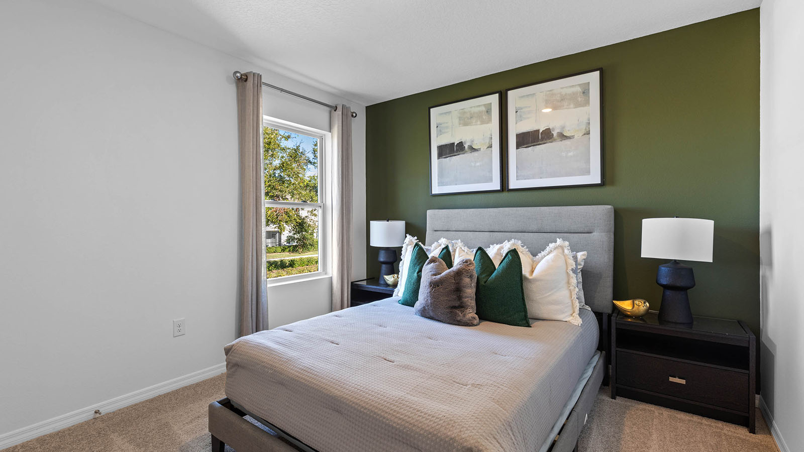 Guest bedroom with queen size bed and two night stands