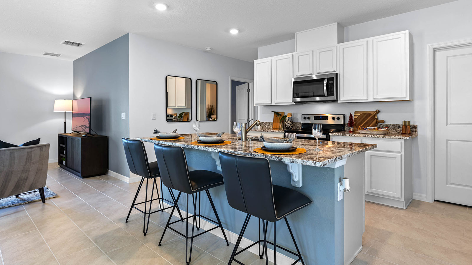 Kitchen island with barstools and sink