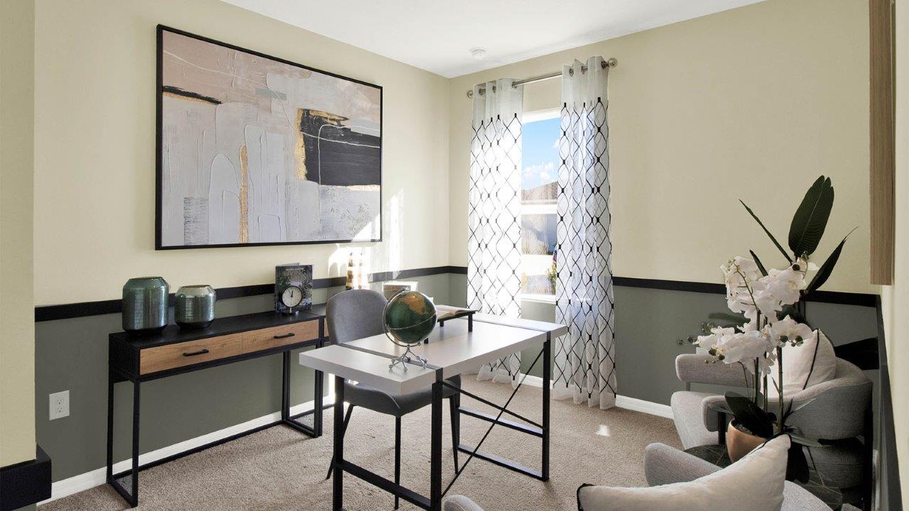 guest bedroom decorated as an office space