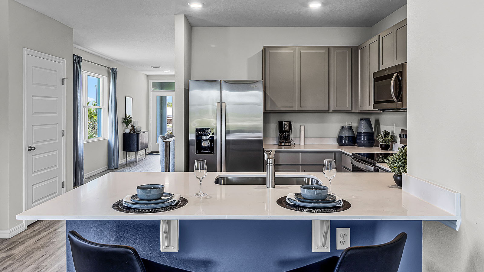 Kitchen with island and barstools