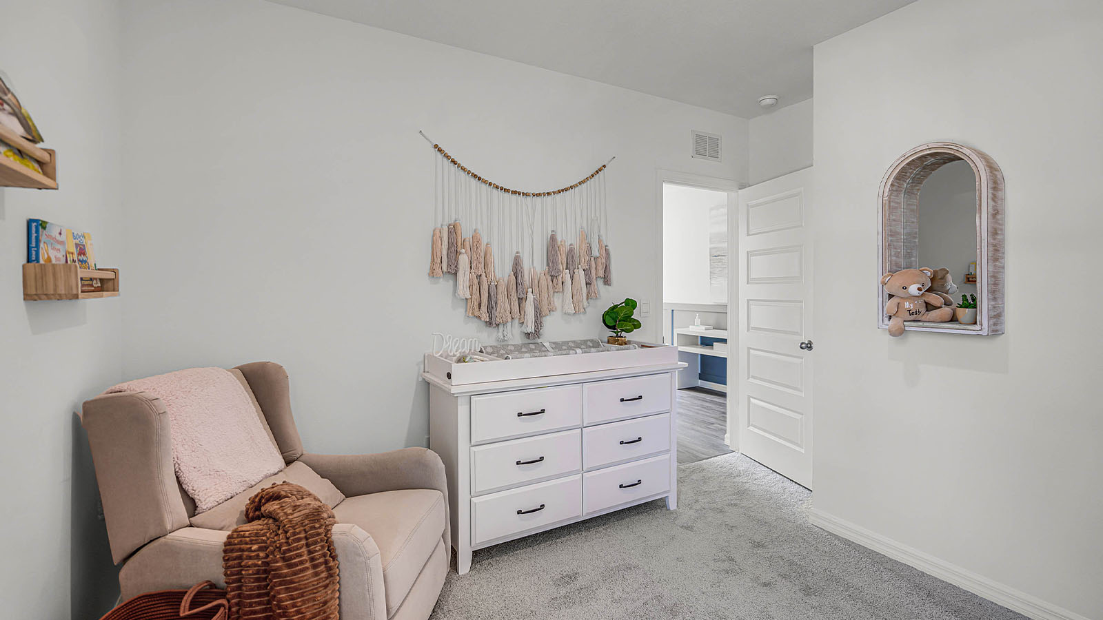 Carpet throughout the nursey room