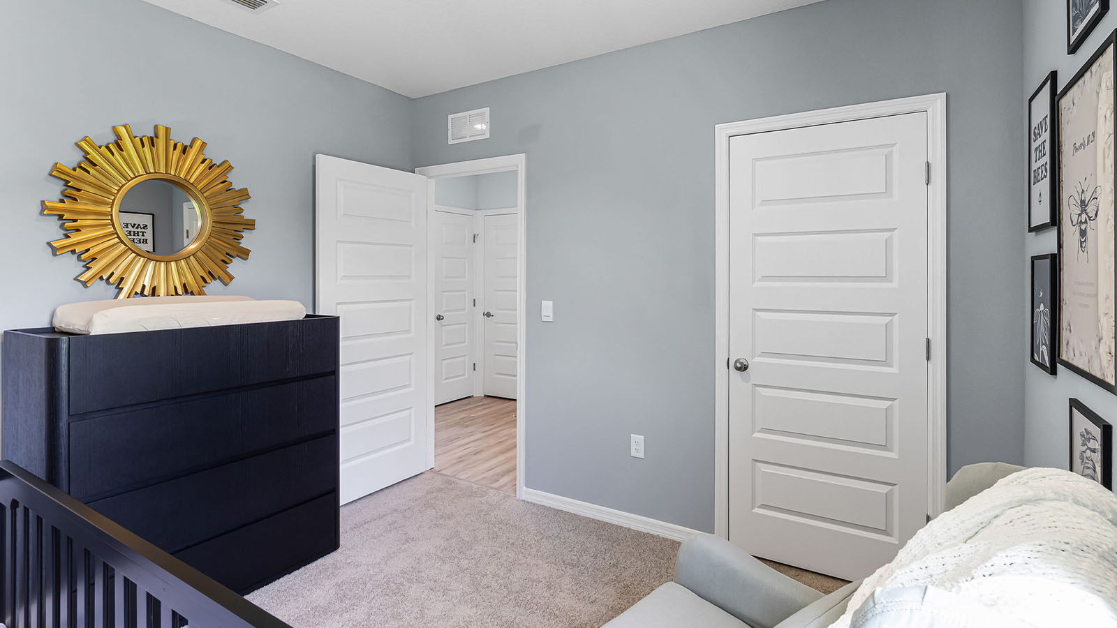 Nursery room showing bedroom door