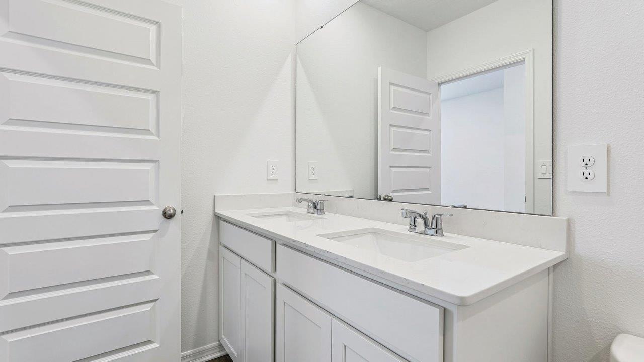 Guest bathroom with dual vanity sinks