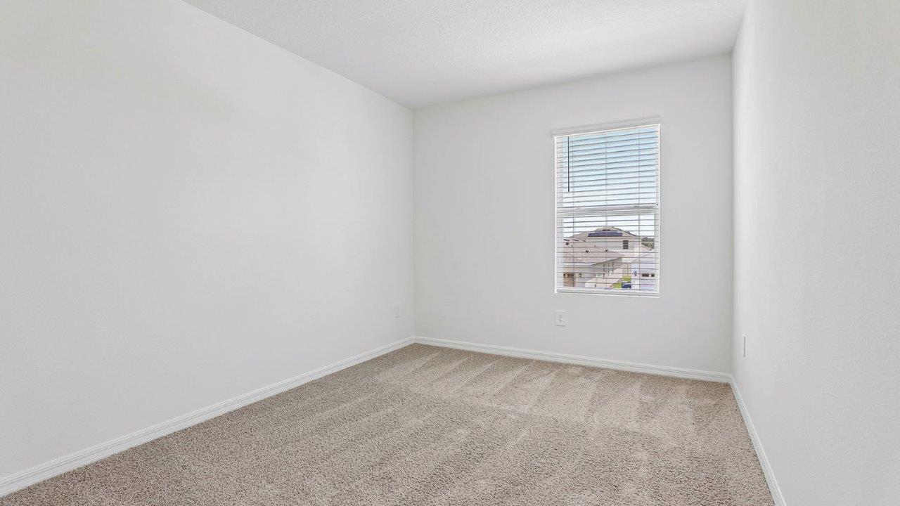Bedroom 3 with carpet flooring