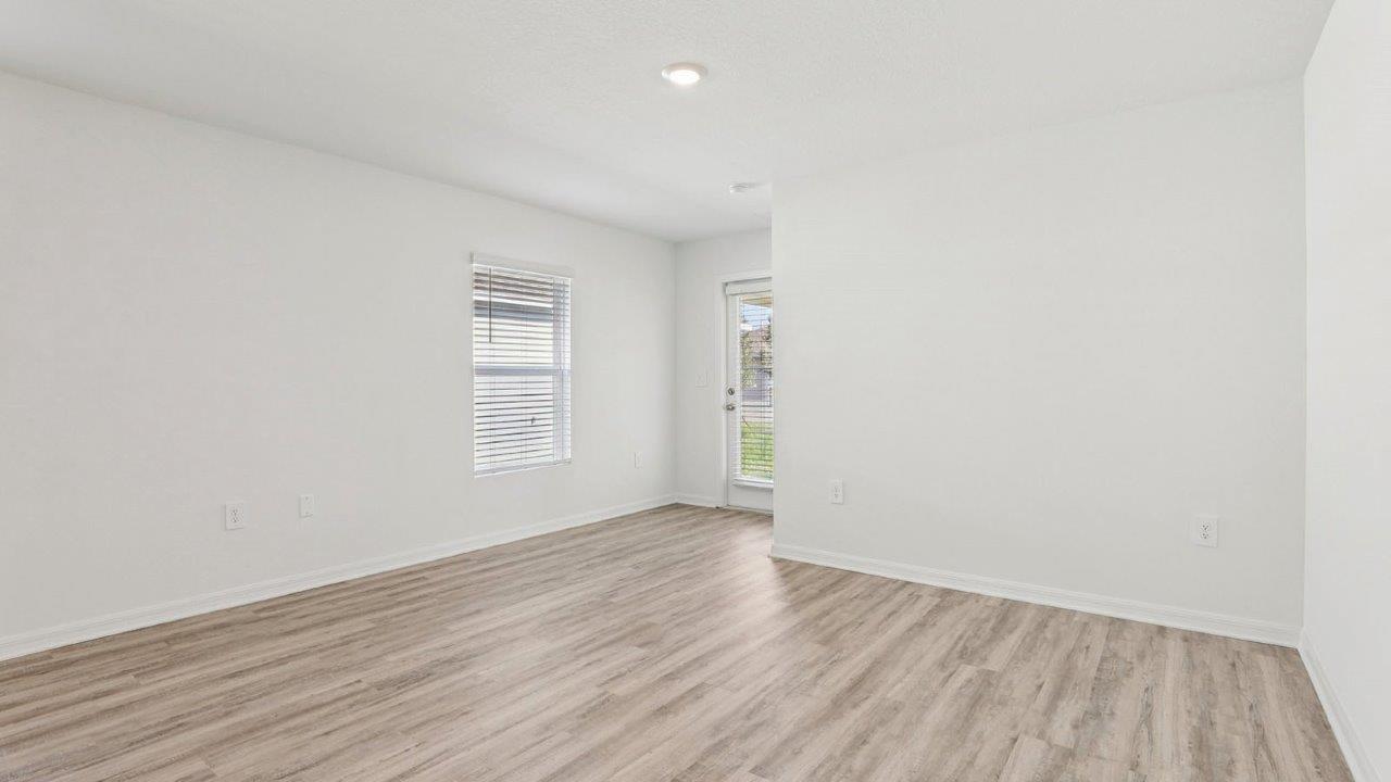 Living with with window and back door