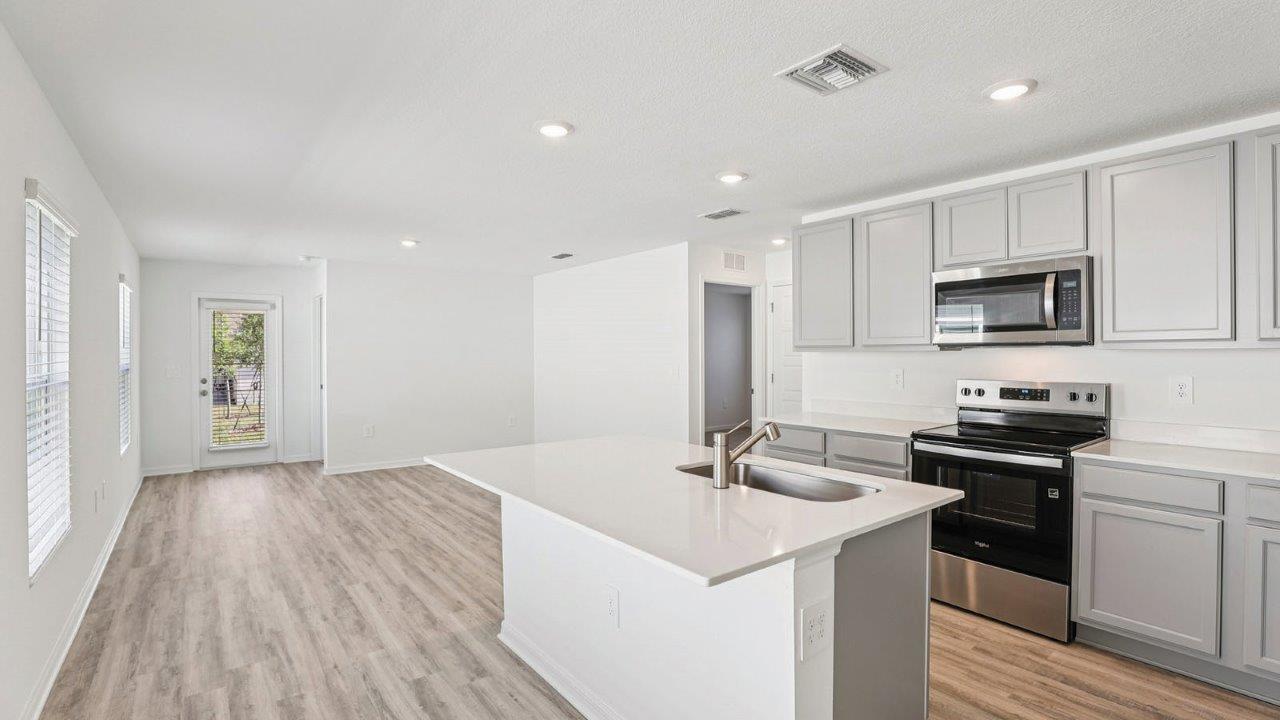 Kitchen with view of open concept living