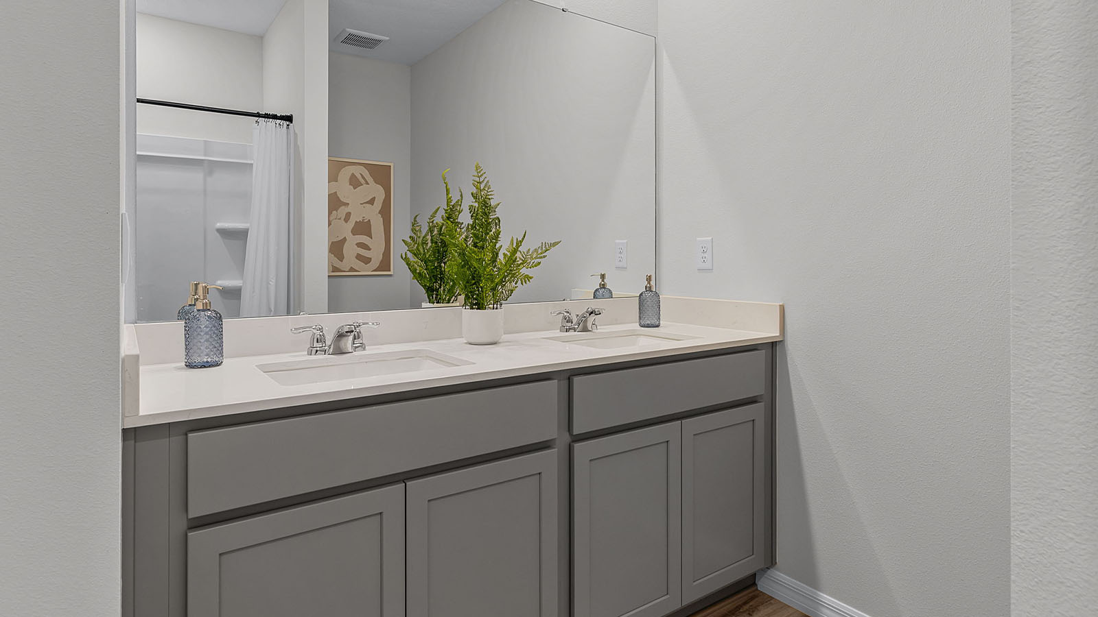 Primary bathroom with double vanity sink