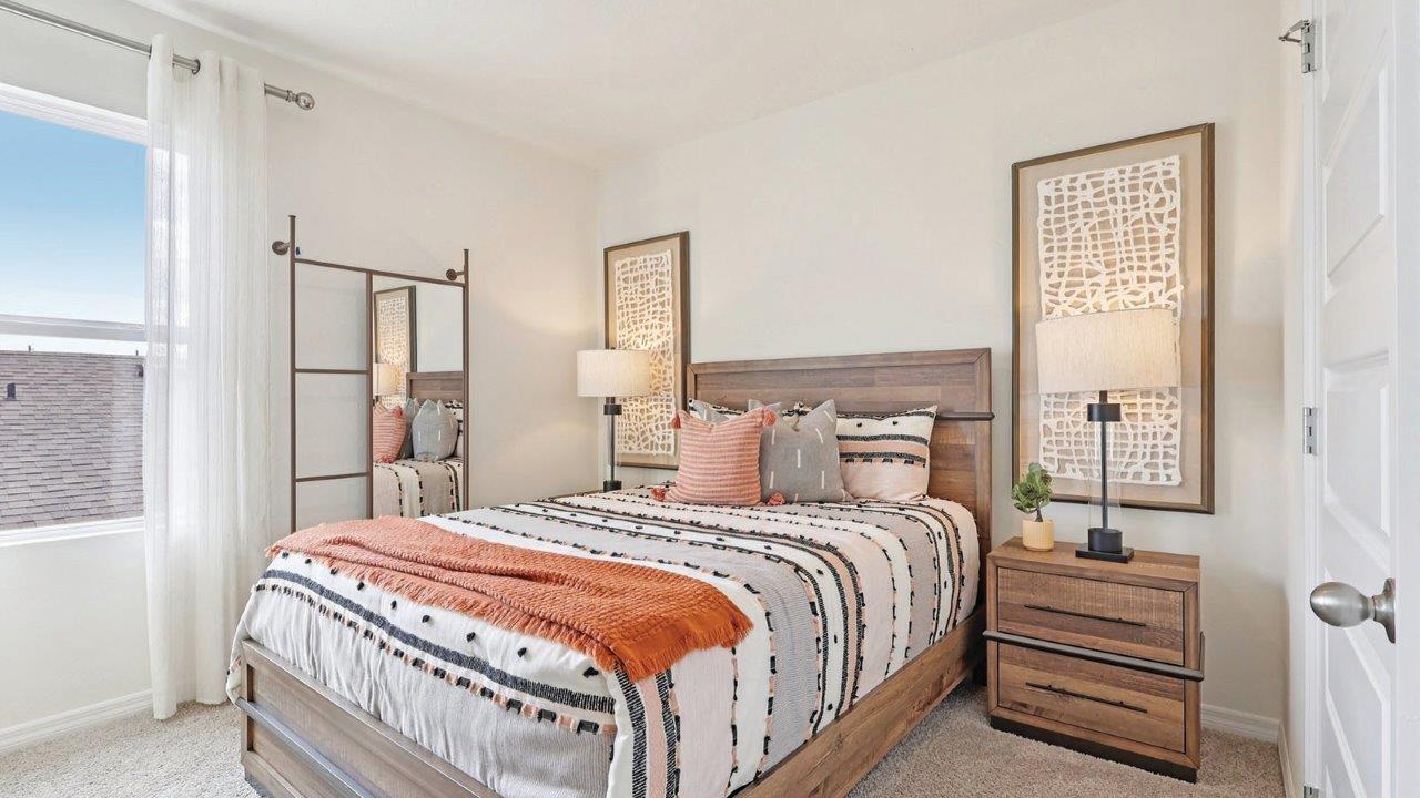 Guest bedroom with bed and nightstand