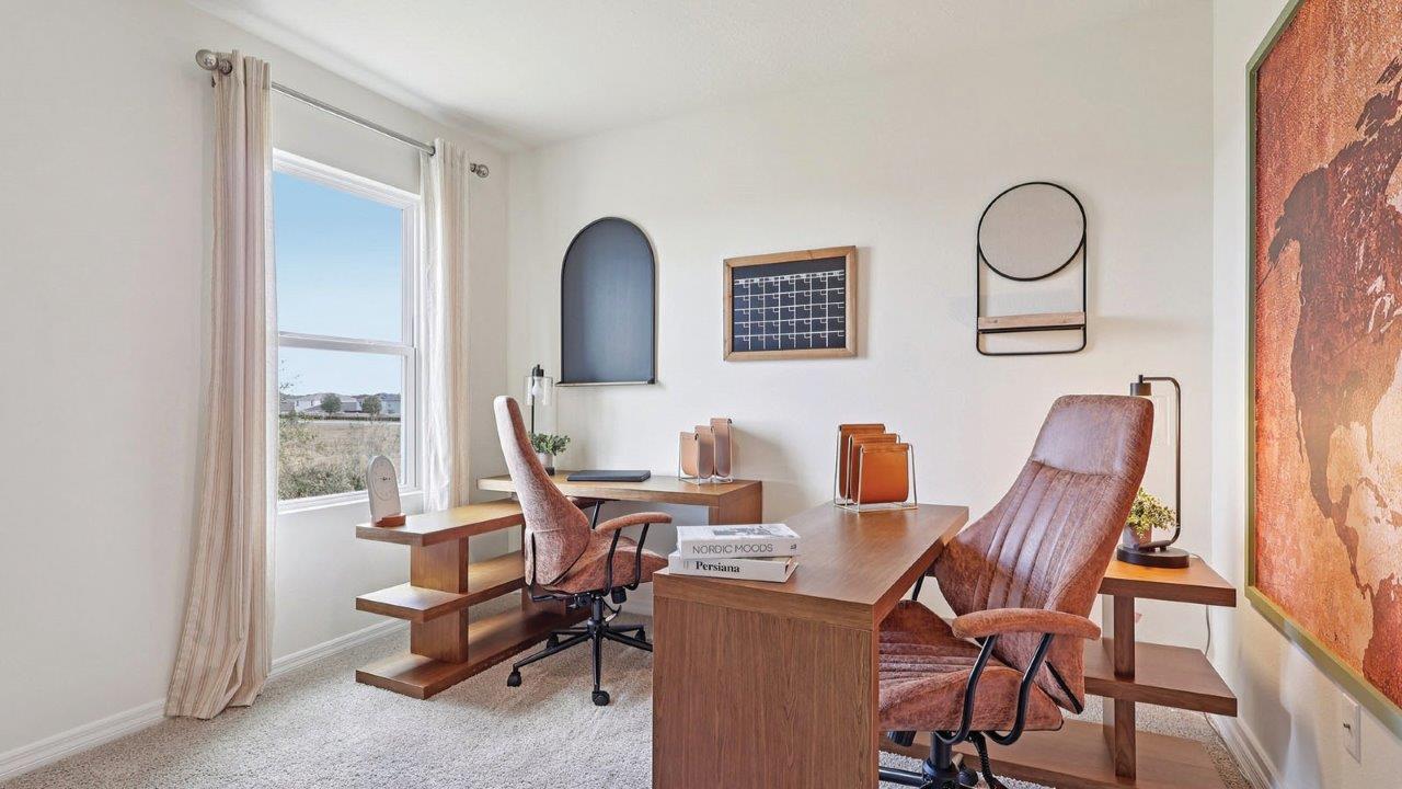 Guest bedroom decorated as an office