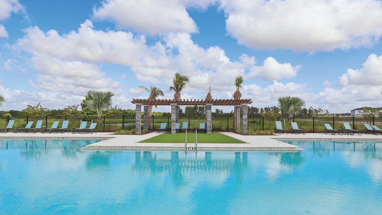 community pool with lounge space