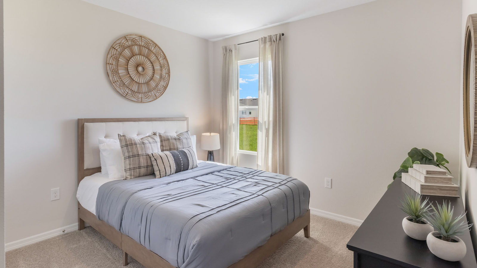 Guest bedroom with carpet throughout
