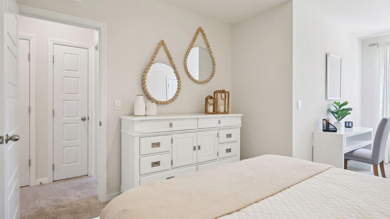 Guest room with dresser and nook