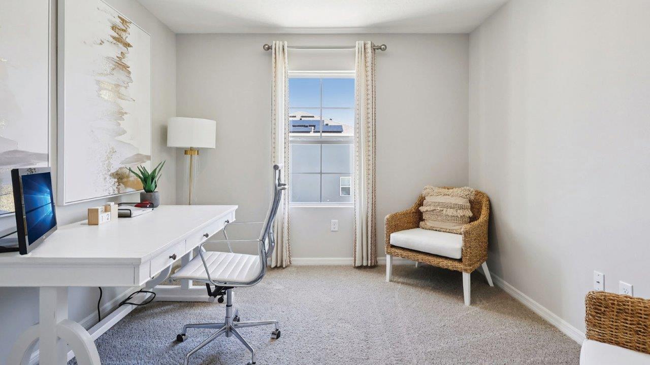 Office with desk and chairs