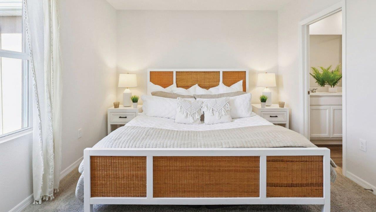 primary bedroom with king size bed