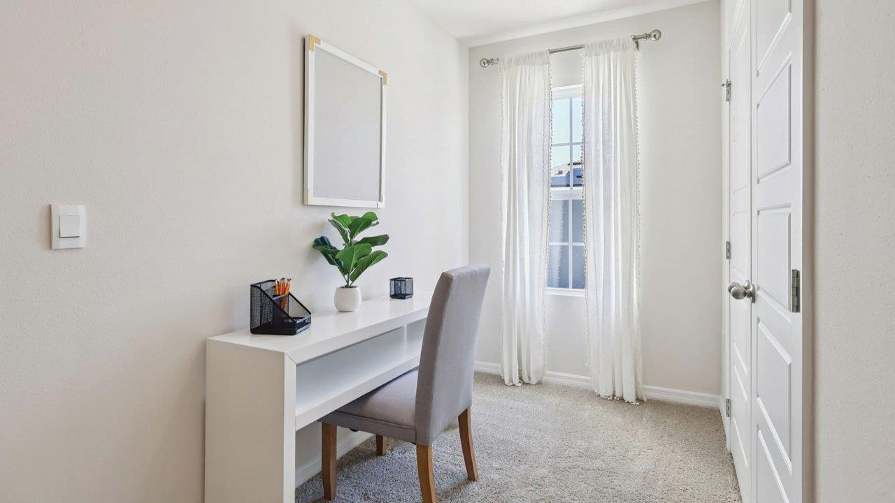 Guest room nook with desk and closet