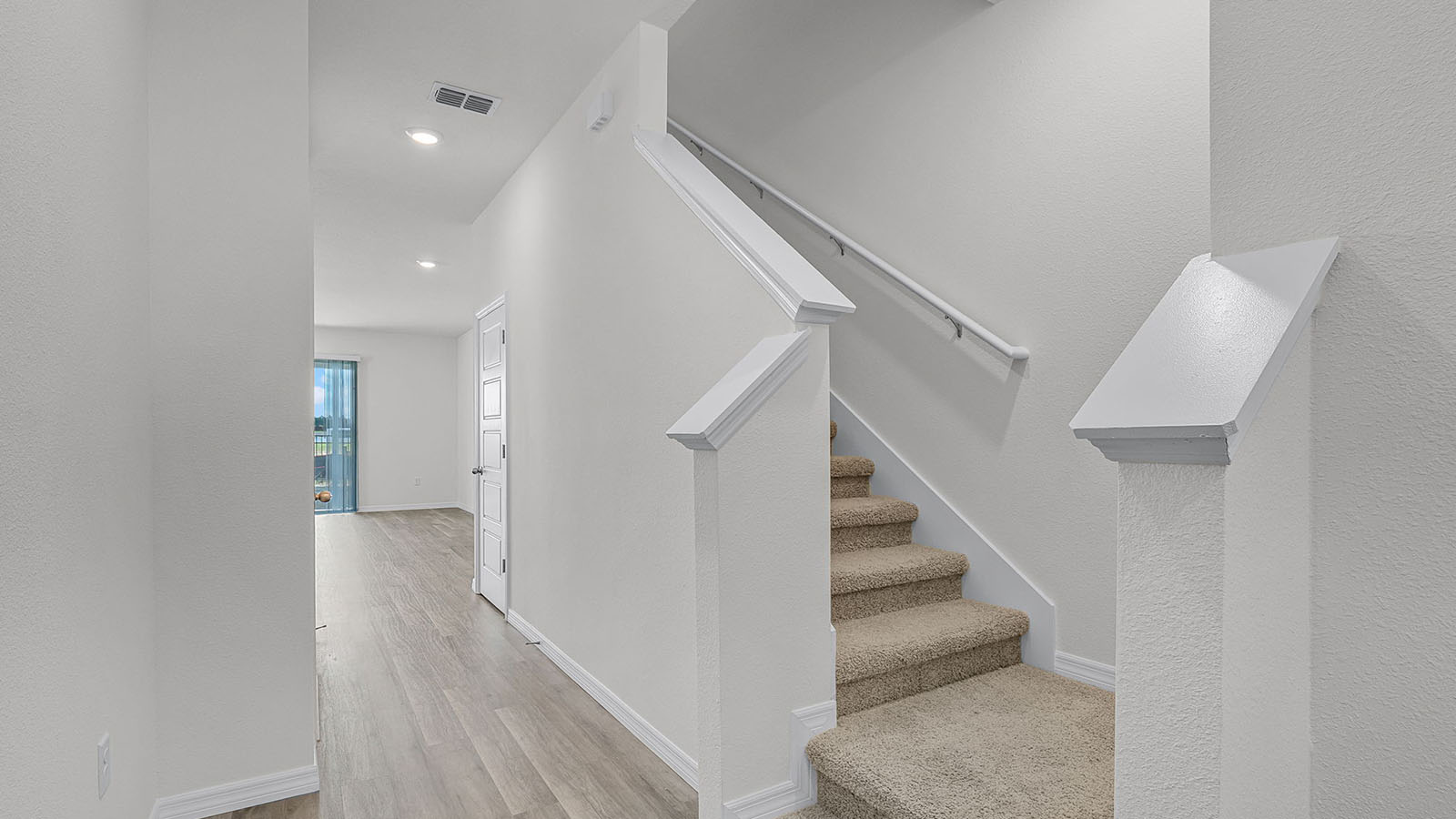 entry hallway with views of the stairs